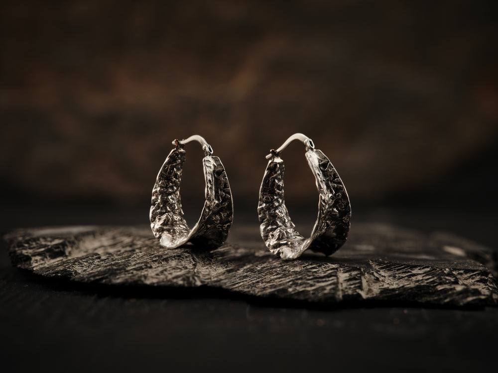 
                  
                    Upload image to gallery, Textured silver earrings with silver sleeper clasp.
                  
                