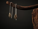 Ear hooks in brass and textured teardrop shape.